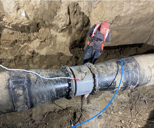 Electromagnetic flow meter installation on underground pipeline, Delhi